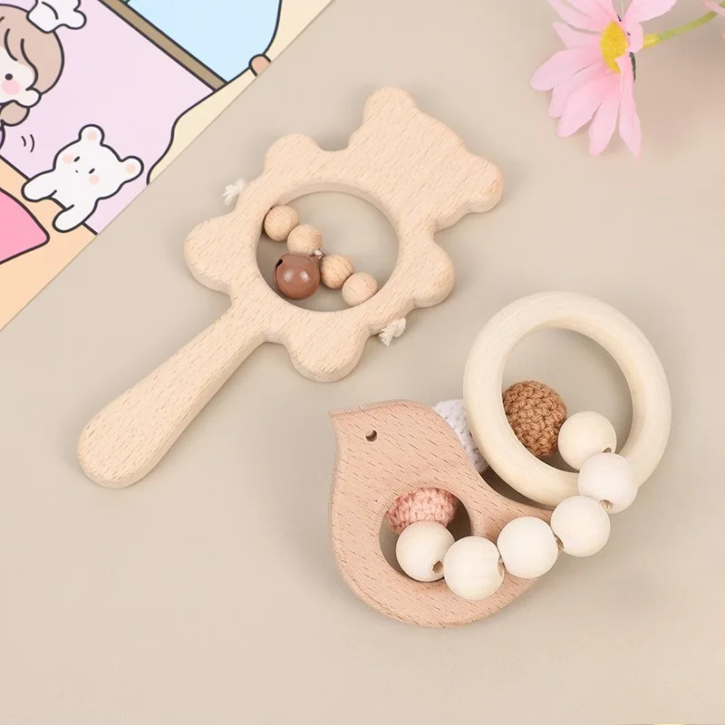 Nuovo sonaglio per bambini, giocattolo portatile, dentizione per bambini, braccialetto in legno di faggio mordibile