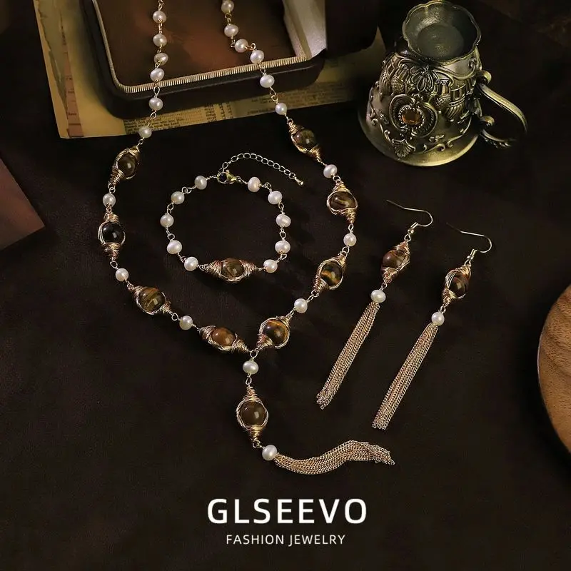 Design: A Set Of Three Jewelry Pieces Featuring A Natural Pearl And Tiger'S Eye Stone Including A Tassel Necklace B
