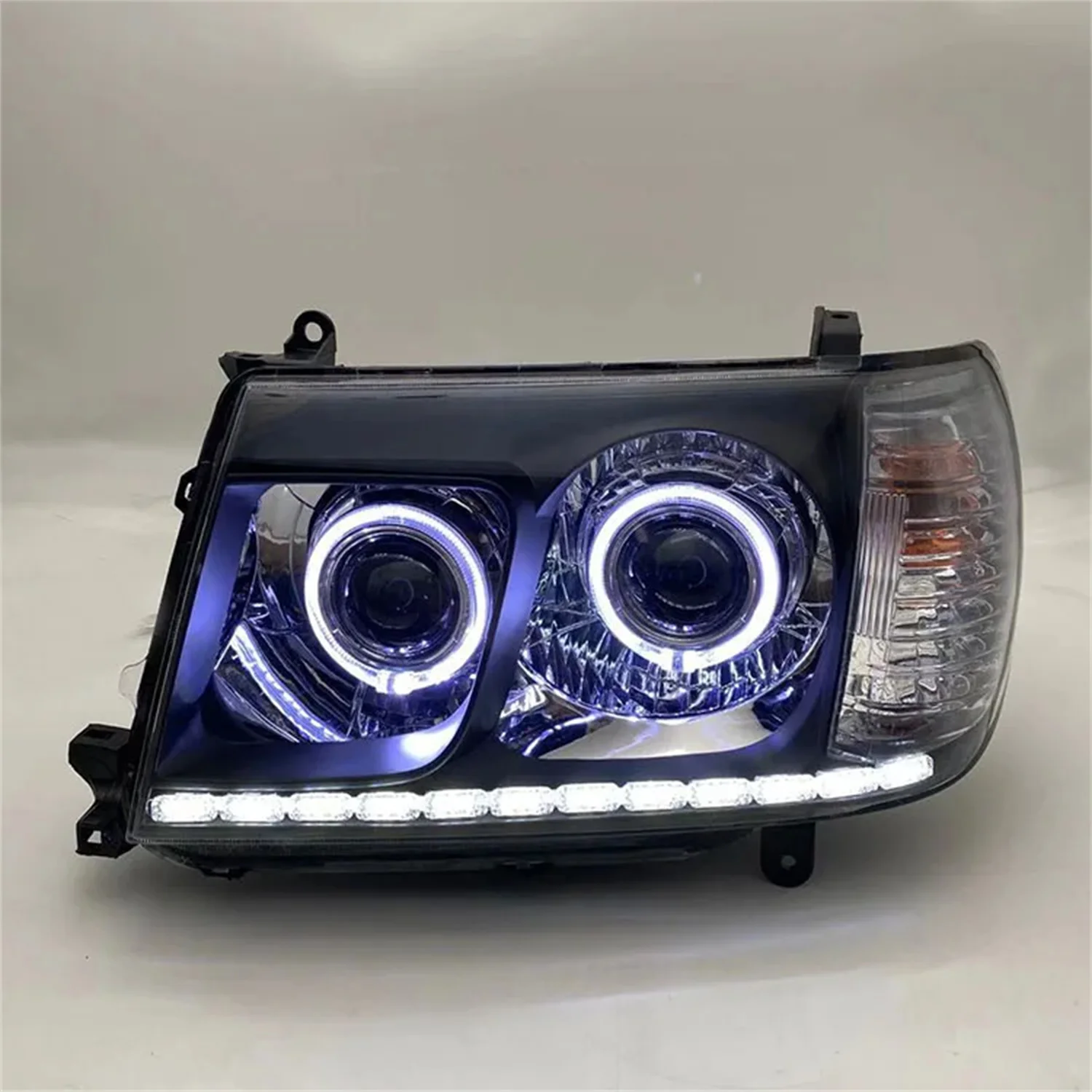 

Car LED Headlight for Toyota Land Cruiser LC100 4700 Angel Eye Daytime Running Light Drl Turn Signal with Projector Lens