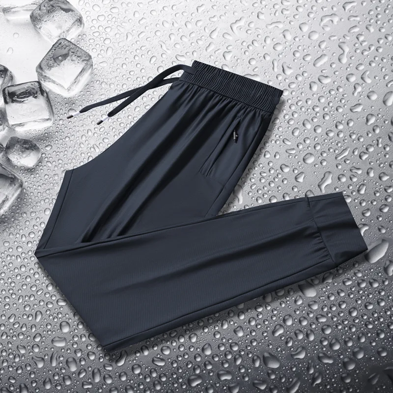 Pantalones casuales finos de seda helada, de secado rápido y frescos tanto para hombres como para mujeres, con material elástico para ropa deportiva relajada