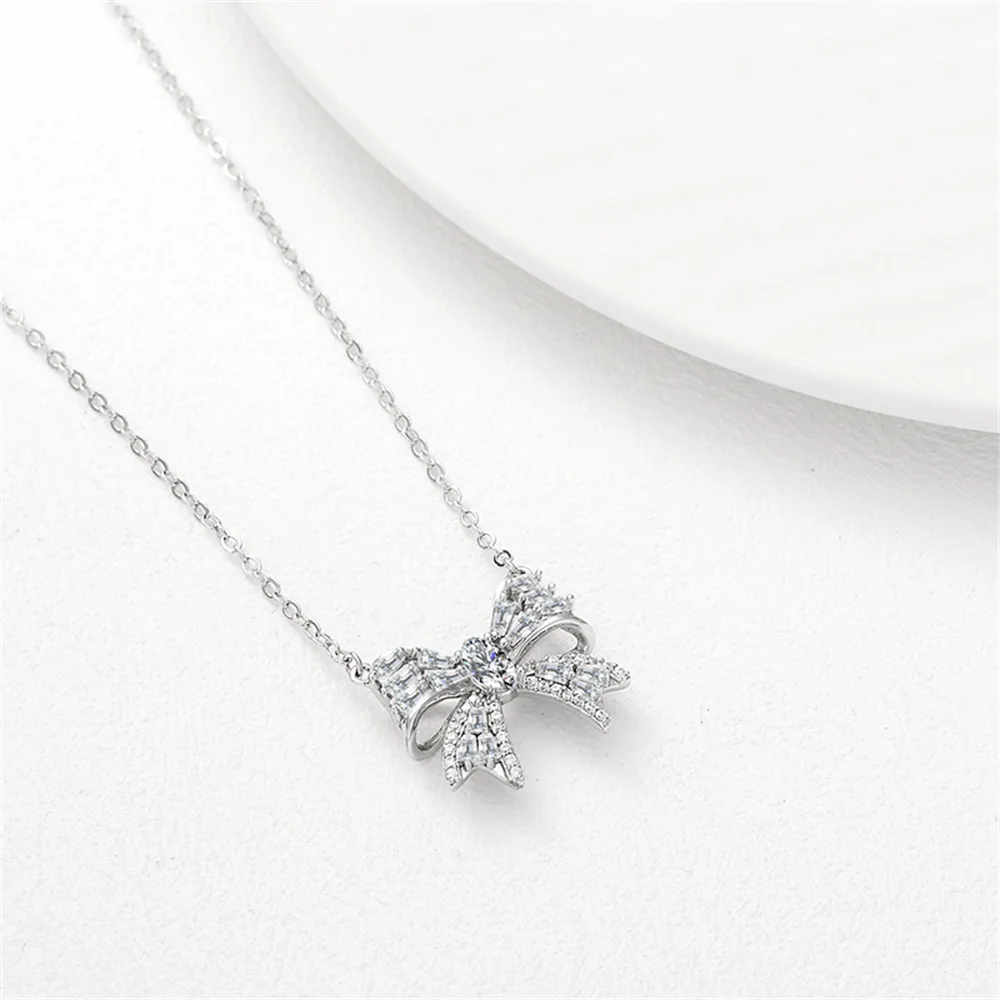 

Европейско-американское нишевое высококачественное ожерелье с бантом, стерлинговое серебро S925, сверкающий циркон, легкая роскошная женская цепочка на ключицу