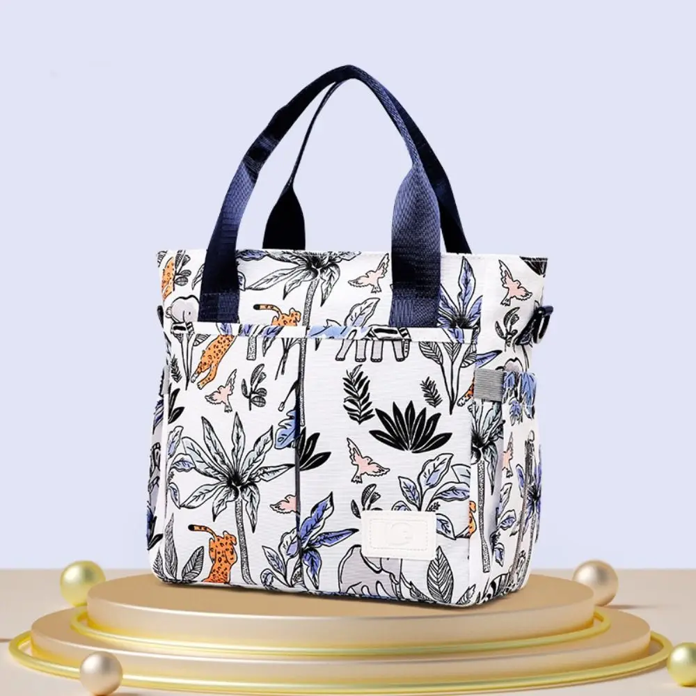 Draagbare waterdichte mama handtas Oxford afdrukken babyluiertas effen kleur grote capaciteit babyverzorgingstas reizen