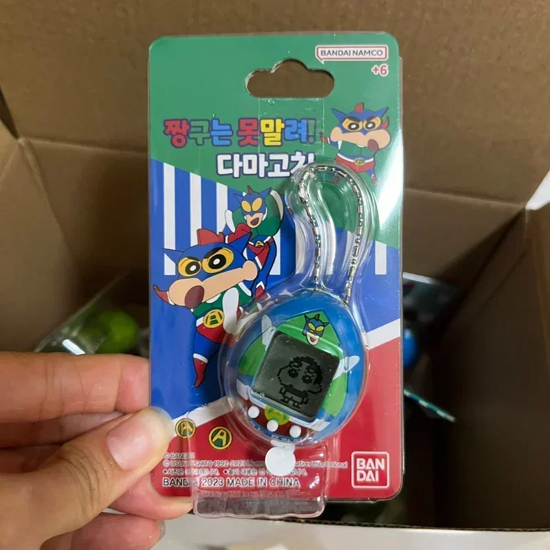 Bandai Crayon Shin-Chan Dynamic Superman Tamagotchi Tamagotchi Egg Toy coltivazione intelligente per bambini macchina da gioco giocattolo regalo