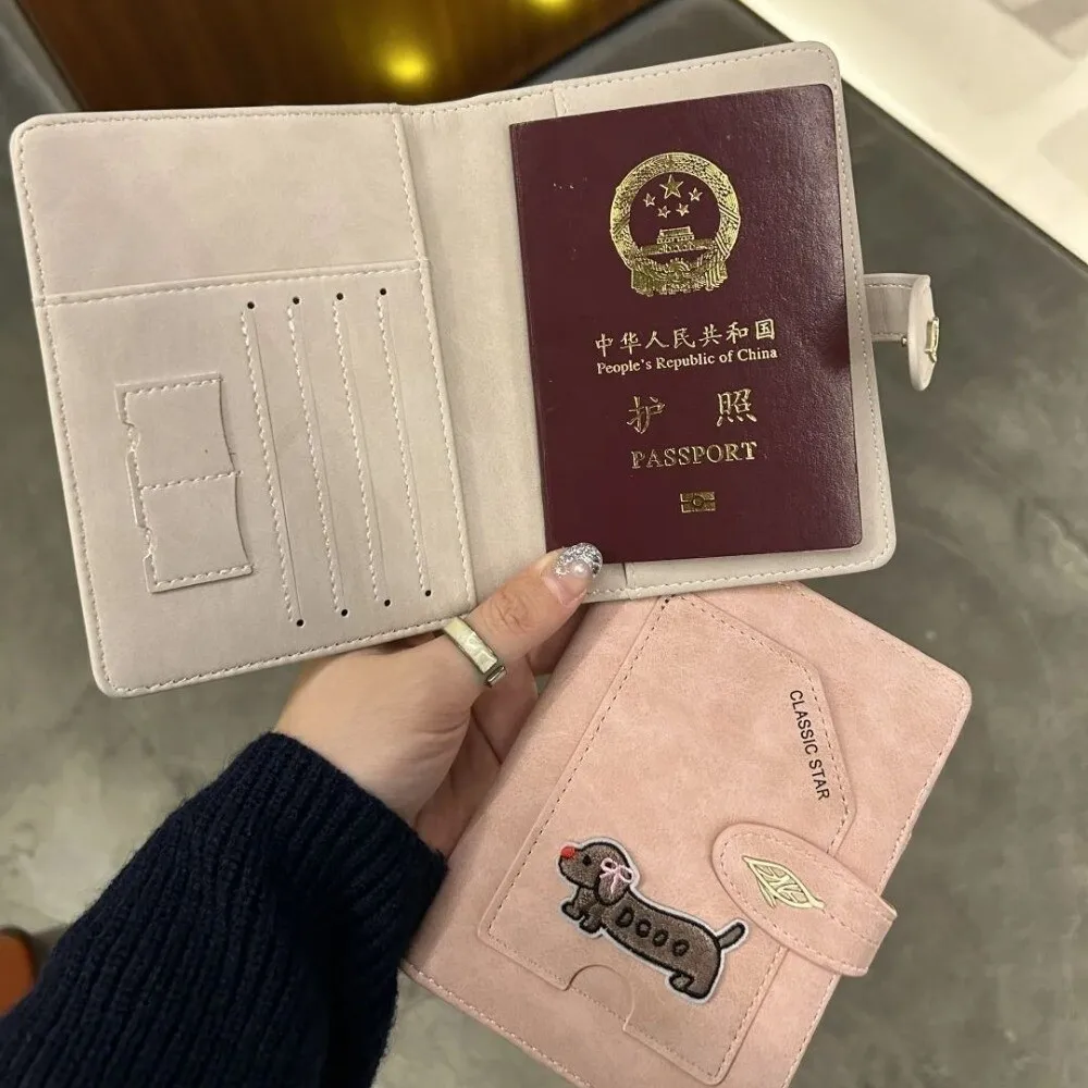 ปกหนังสือเดินทางลายการ์ตูนสัตว์ ดีไซน์ RFID วัสดุกันน้ำ พร้อมที่หนีบตั๋ว หนัง PU ปักลายสุนัข