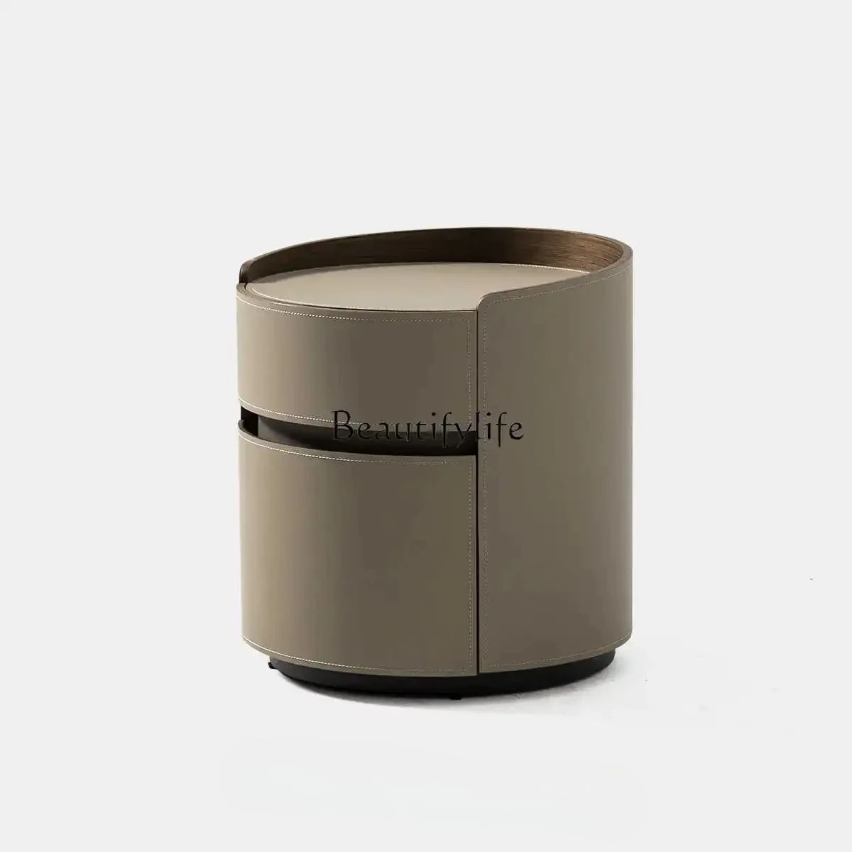 

88.Saddle leather round bedside table Italian light luxury designer bedroom minimalist high sense