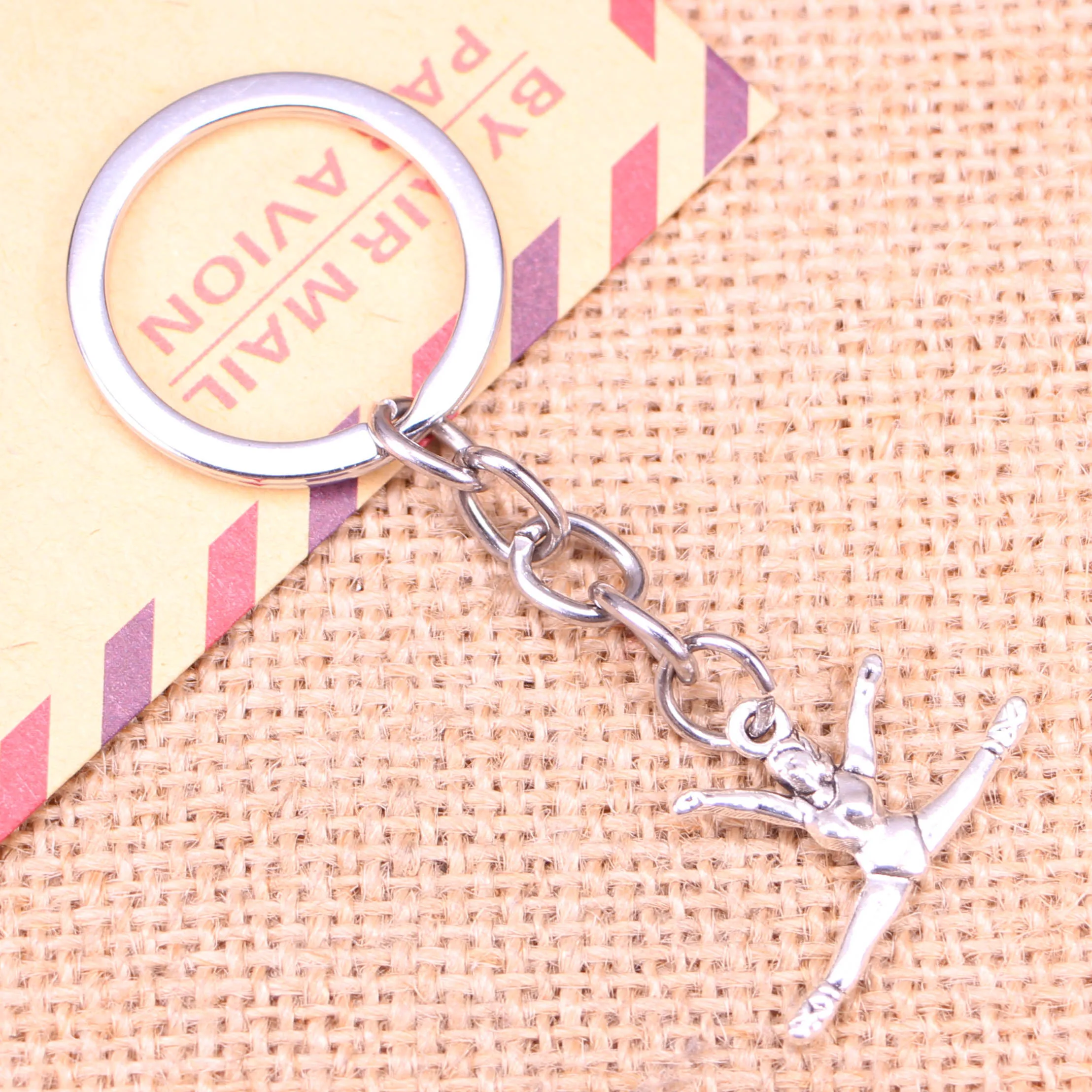 20pcs New Fashion Keychain 22x16mm gymnastics gymnast sporter Pendants DIY Men Jewelry Car Key Chain Souvenir For Gift