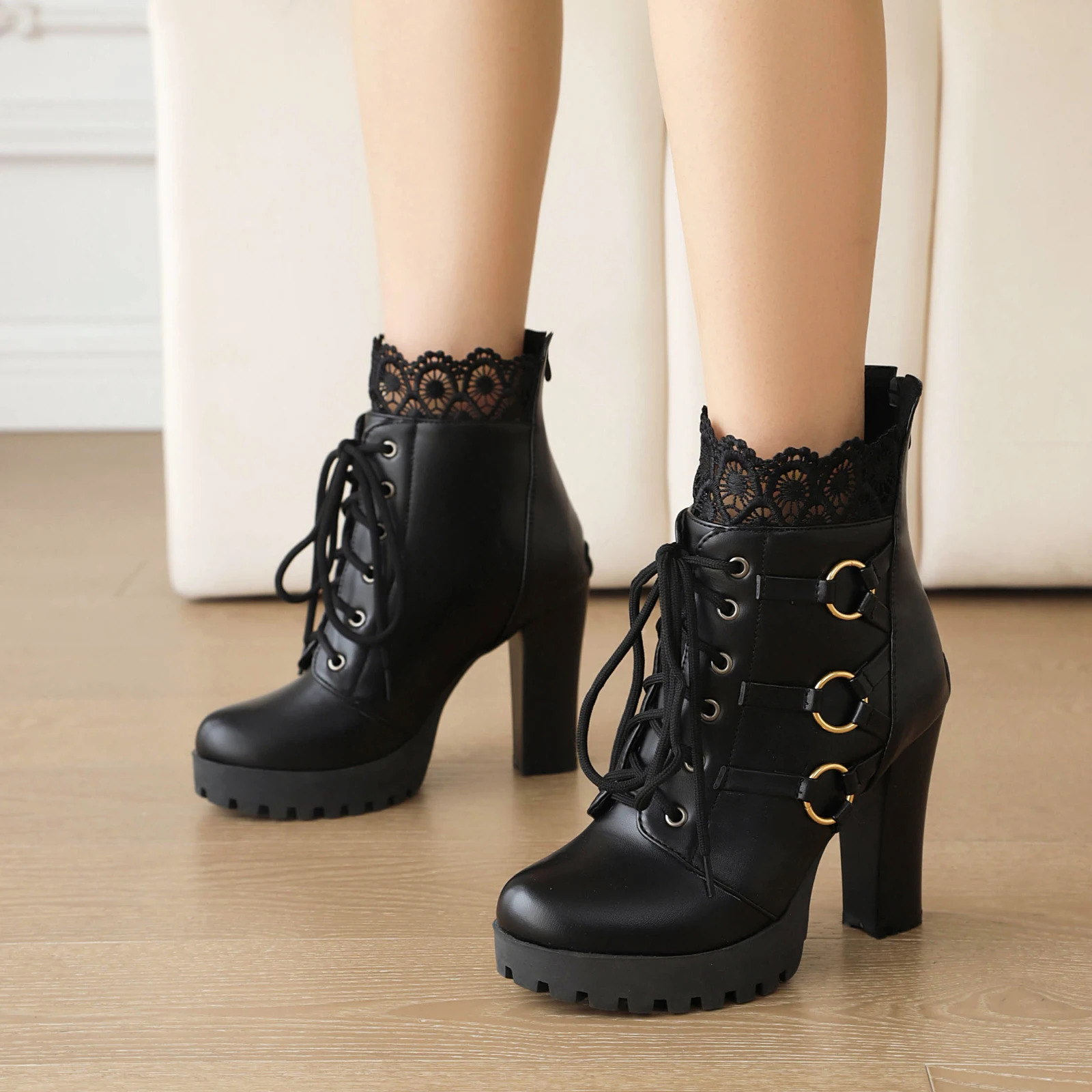 

Hot Bootie Stitching PU Cross Tie Winter Short Boots with Three Rows of Circular Metal Buckles Decorated Zippers Boots