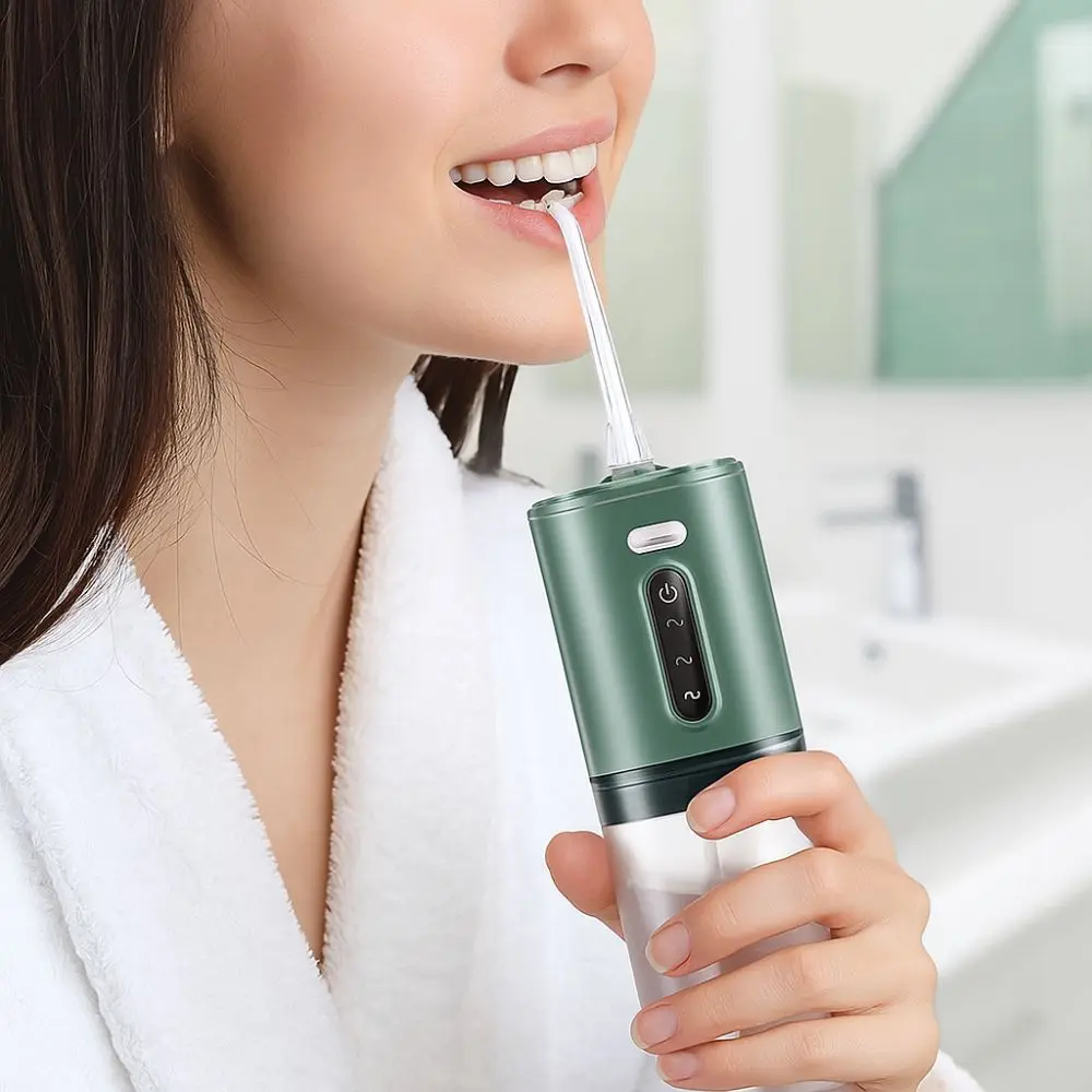 

Ирригатор для полости рта с зарядкой через USB, глубокая очистка, портативный очиститель зубов, трехчастотные импульсы, электрическая зубная щетка, брекеты, чистка