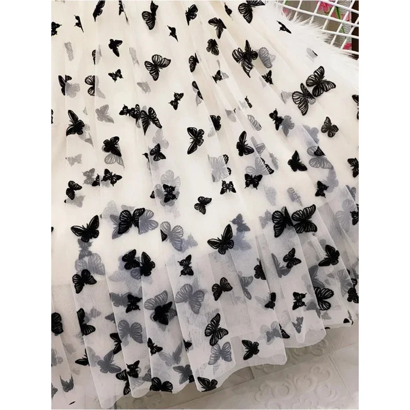 กระโปรงยาวผ้าทูลล์รูปผีเสื้อสำหรับผู้หญิงกระโปรงตาข่ายคลุมเข่าเอวสูงสีดำแบบลำลอง