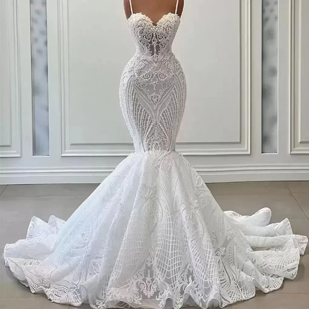 

Customized Spaghetti Straps Full Pearls Mermaid Wedding Dresses Vestido De Noiva African Luxury See Through Bridal Gowns
