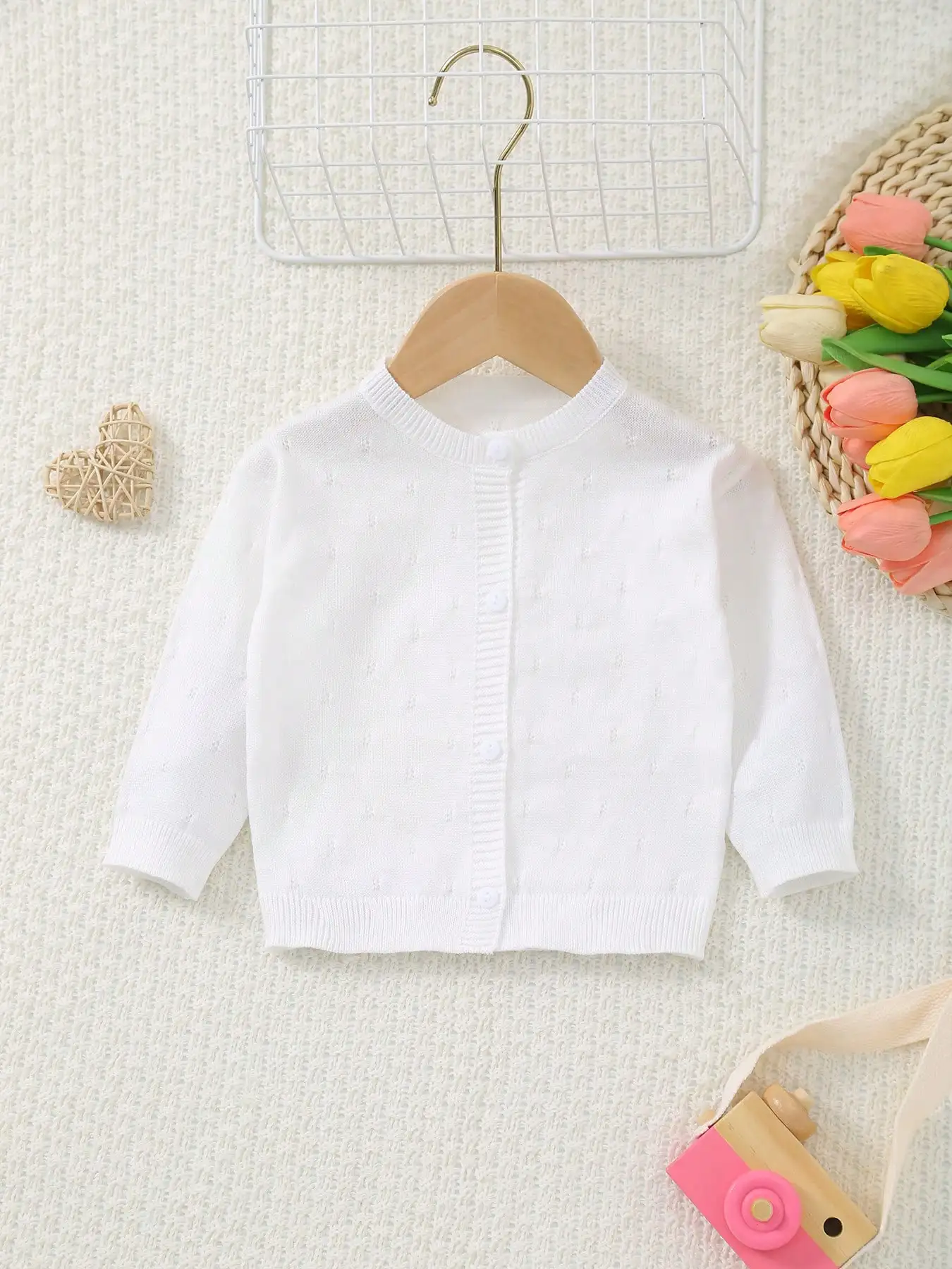 cardigan-de-malha-de-cor-pura-com-gola-redonda-para-bebe-com-furos