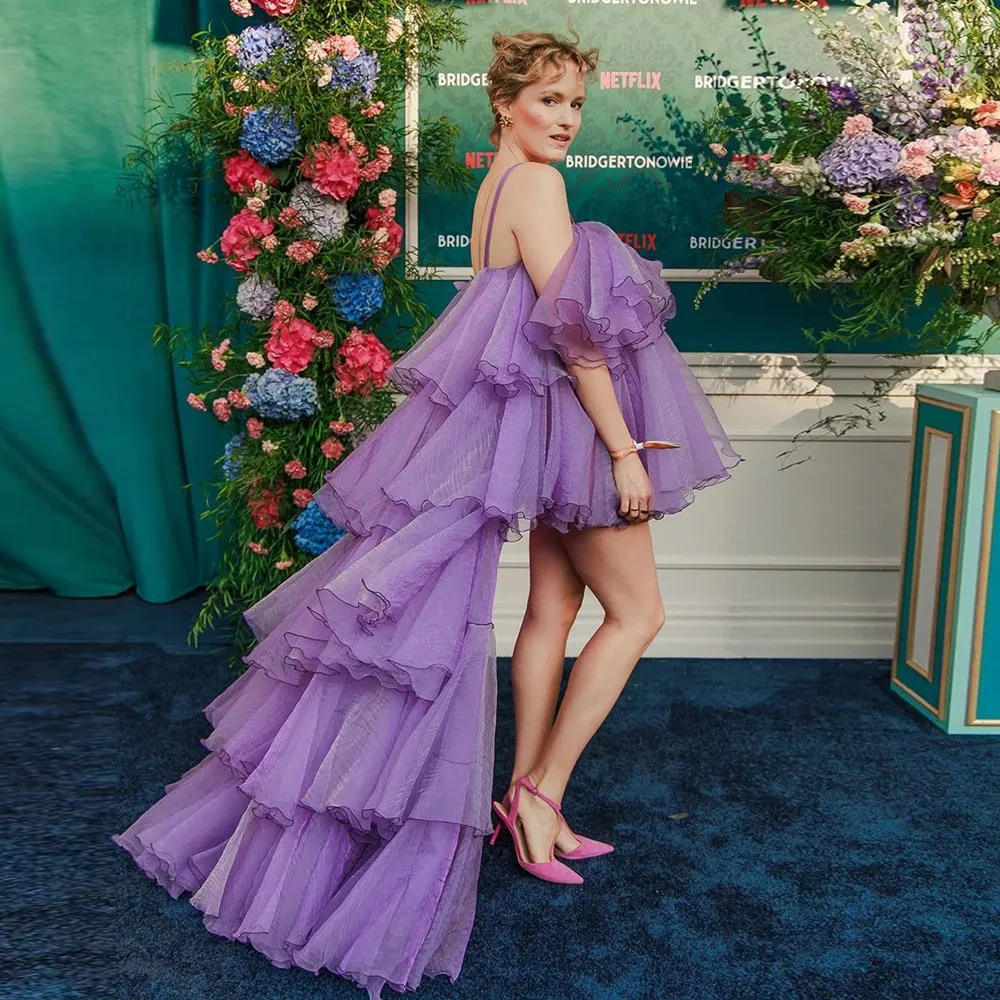 

Purple Layered Dress With Ruffles And Asymmetrical Hemline Features Flowy Fabric And Strapless Design Paired High Low Dresses