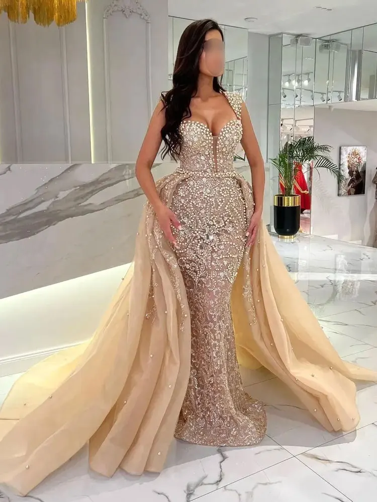 

Arabic Dubai Champagne Mermaid Evening Dresses With Detachable Skirt Beadings Crystals Pearls Cap Sleeve Long Prom Party Gowns