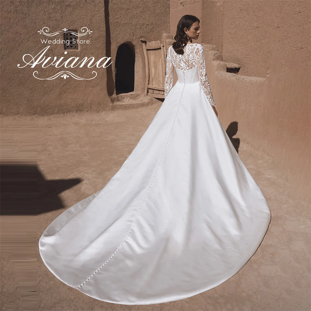 Aviana فستان زفاف مخصص سويب تراين على شكل حرف a رقبة دائرية وأكمام طويلة وزر دانتيل مطرز وصمة عار 2025 طول الأرض بسيط #3