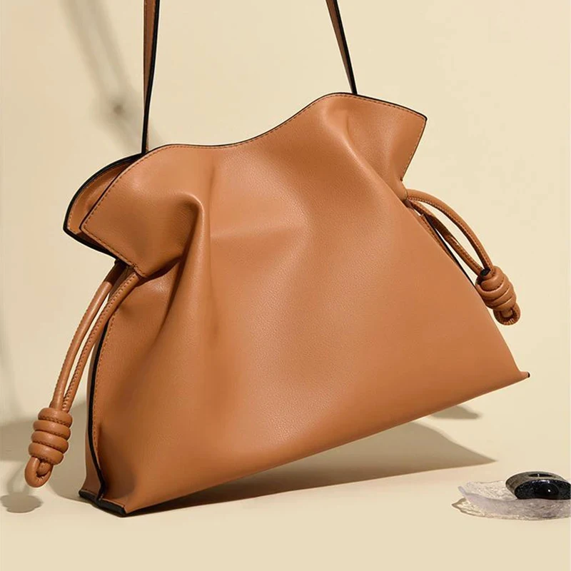 

Luxury candy-colored leather crossbody bag for women, pleated cloud bag, large-capacity designer drawstring travel bag, elegant.