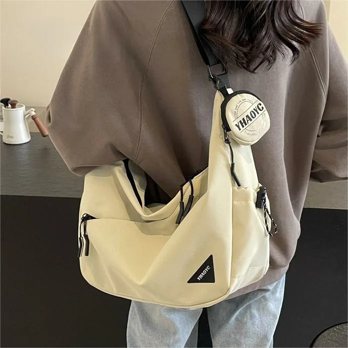 

Trendy Large Capacity Canvas Crossbody Bag for Women Dumpling Shape Casual Simple Design High Fashion Sensation Spring 2026