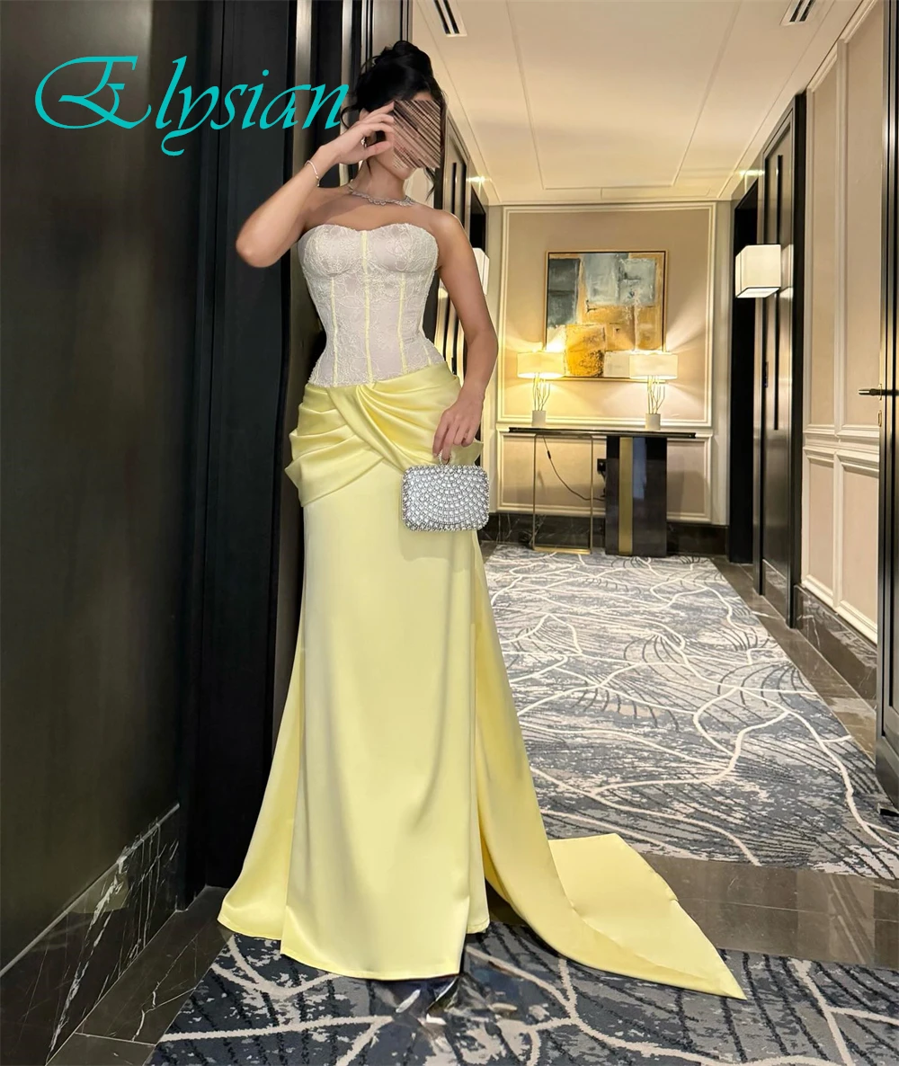 ชุดราตรีสุดหรูแบบสั่งตัดคุณภาพสูง ดีไซน์เกาะอก แขนกุด สง่างาม พร้อมชายกระโปรงยาวแบบคลาสสิก เหมาะสำหรับงานพิเศษ