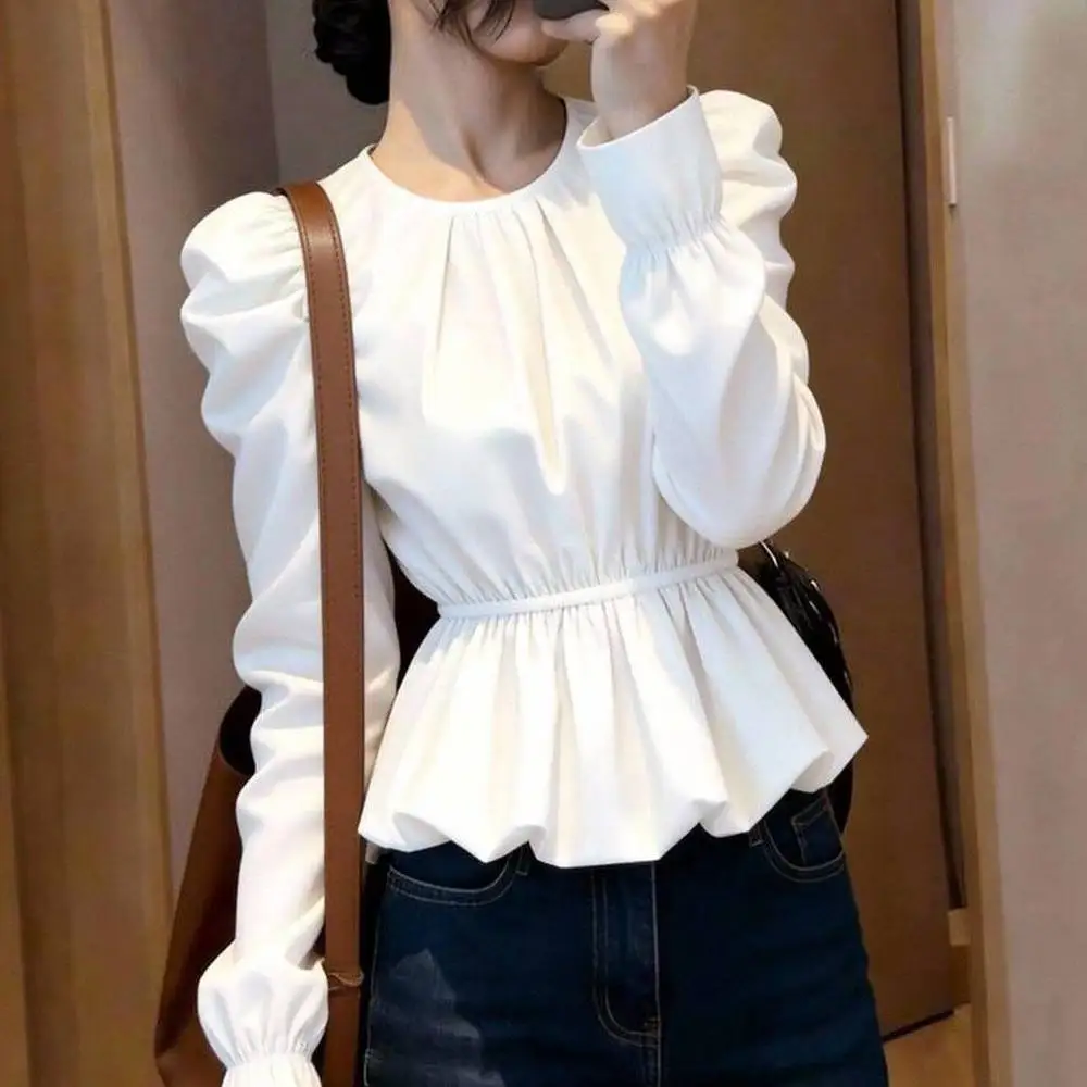 Delicate light white top, round neck bubble sleeves European goods, pleated waist and thin ruffle edge 2026 spring women