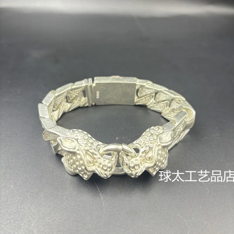 men's-bracelet-with-a-bold-double-leopard-design-made-of-white-copper-and-thai-silver