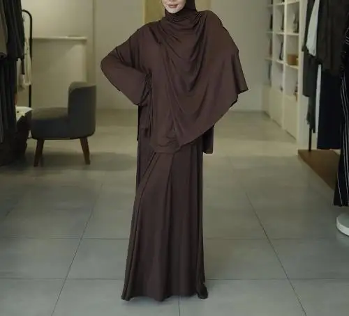 Ensemble deux pièces pour femmes, couleur unie, col haut, manches longues, haut ample et jupe longue pliée décontractée, nouvelle collection printemps automne 2025