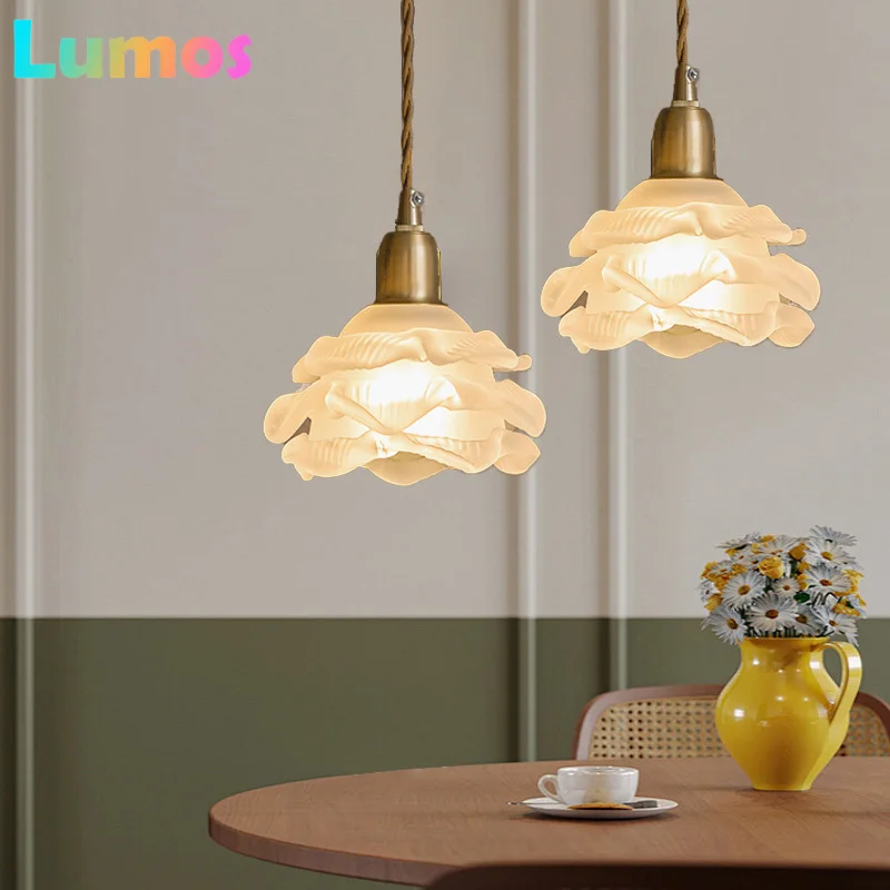 modern-glass-rose-flower-shaped-long-line-bedroom-bedside-sable-chandelier-and-small-dining-room-chandelier-for-warm-lighting