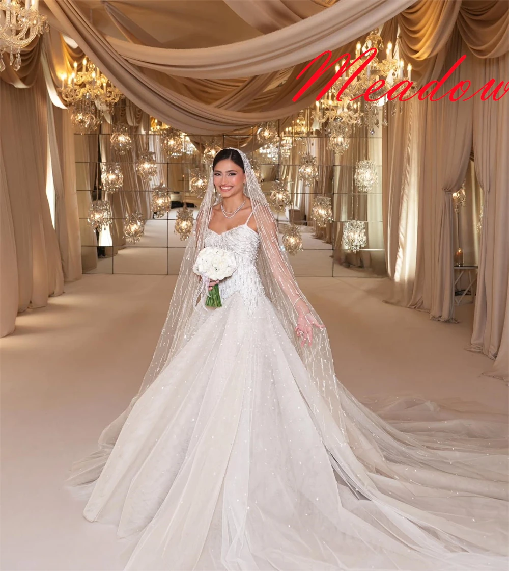 

Customized Exquisite White Tulle Bridal Gowns Elegant Strapless Spaghetti Straps Wedding Dress Chapel Train Backless Dress