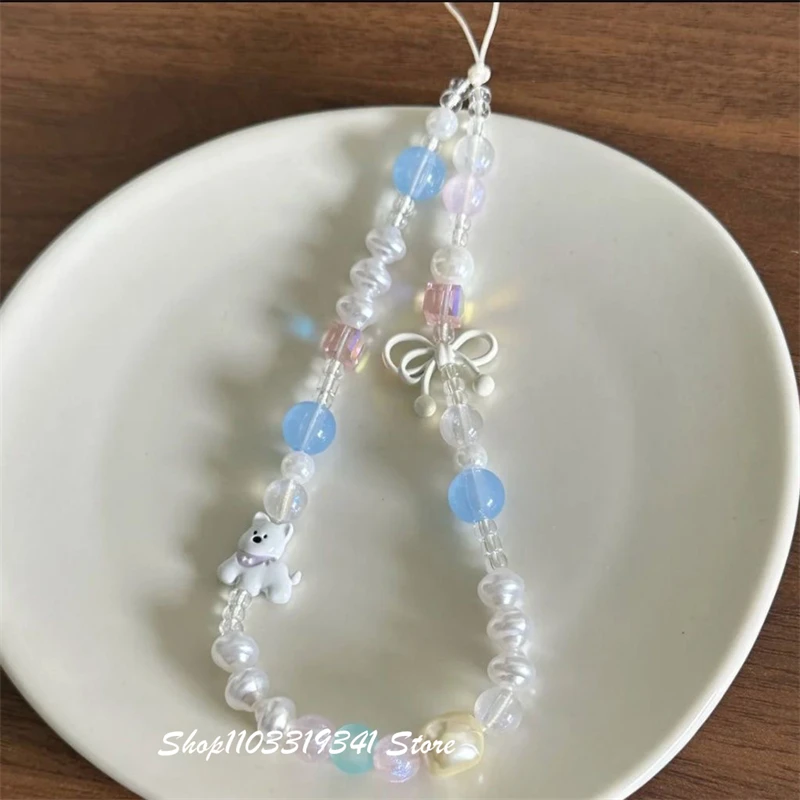 Korean Cute White Bow Puppy Beaded Phone Charms Chain For iPhone 16 Accessories Phone Strap Anti-Lost Lanyard Hanging Rope Girl view 2