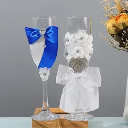 Wedding with 2 champagne glasses, simple blue dress, bar, restaurant, family and anniversary celebration