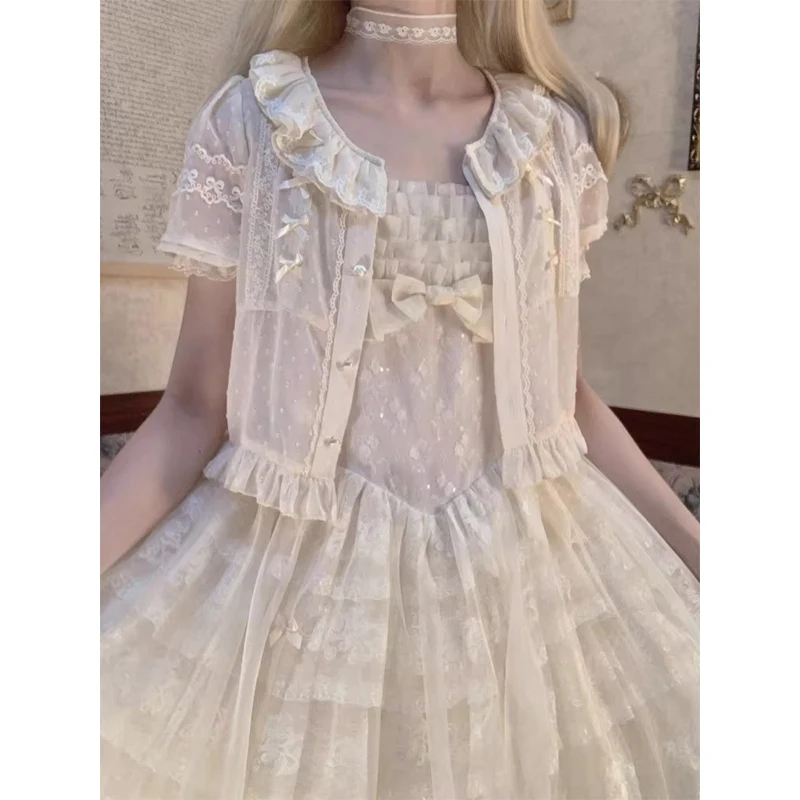 Camicie bianche Lolita giapponesi Donna Camicette in chiffon trasparente con fiocco in pizzo carino Kawaii Top estivi con design a maniche corte con volant vintage