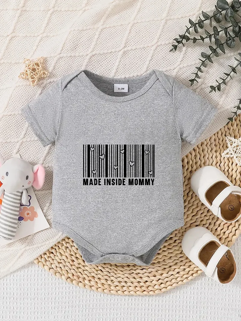 Playful letter-printed baby short-sleeve triangle bodysuit. Button closure for easy dressing, machine washable
