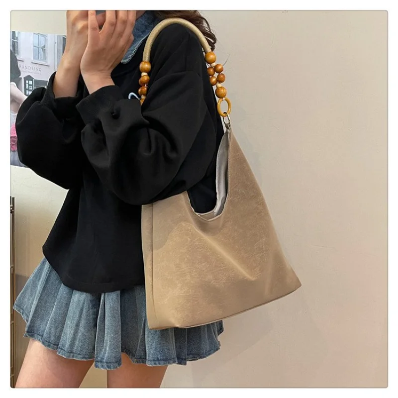 Deluxe dameshandtas gemaakt van achthoekig bedrukt leer, trendy Wales Vintage Commuter ruime stijl