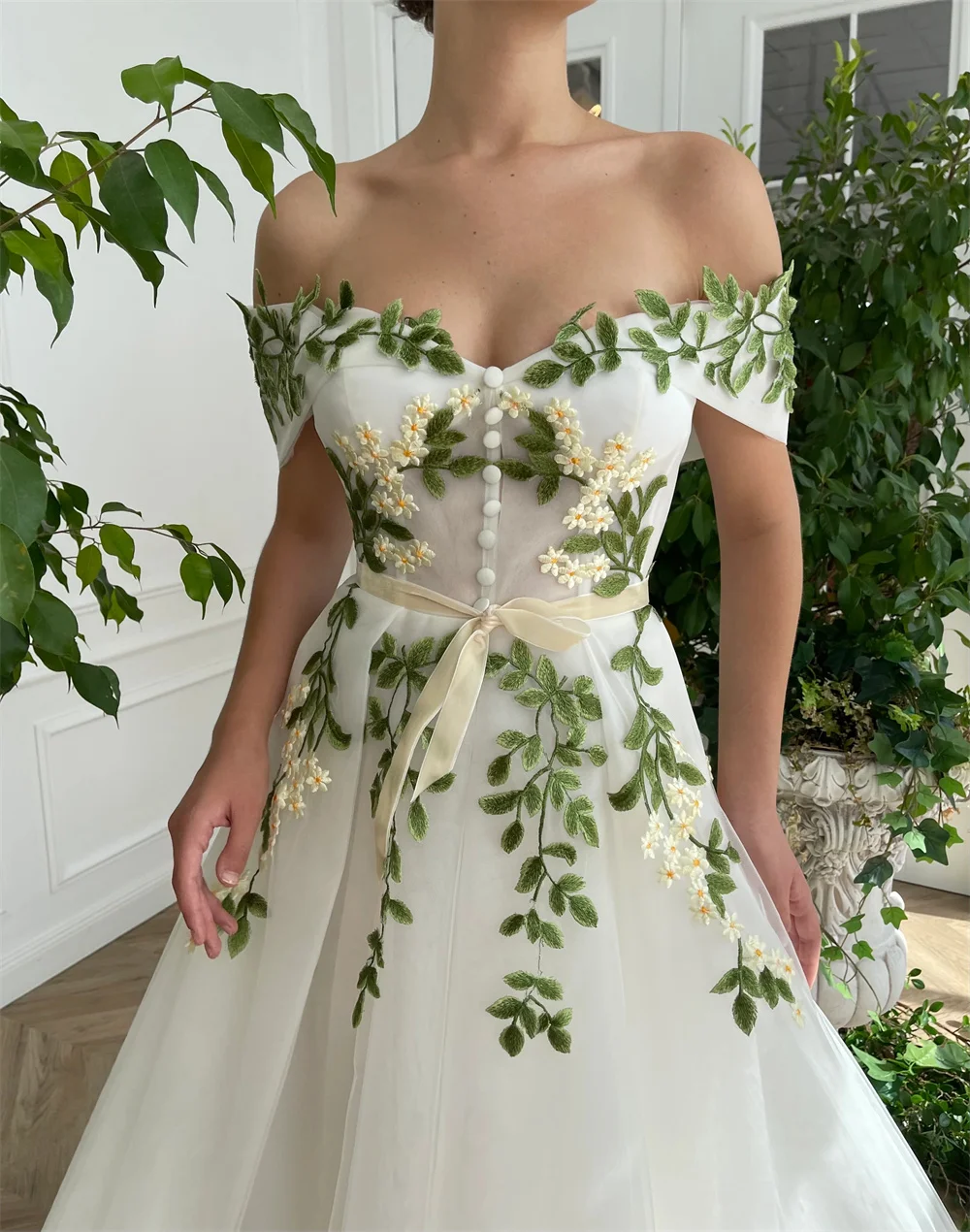 Customized Off Shoulder Leaf Embroidery Button Wedding Dress A