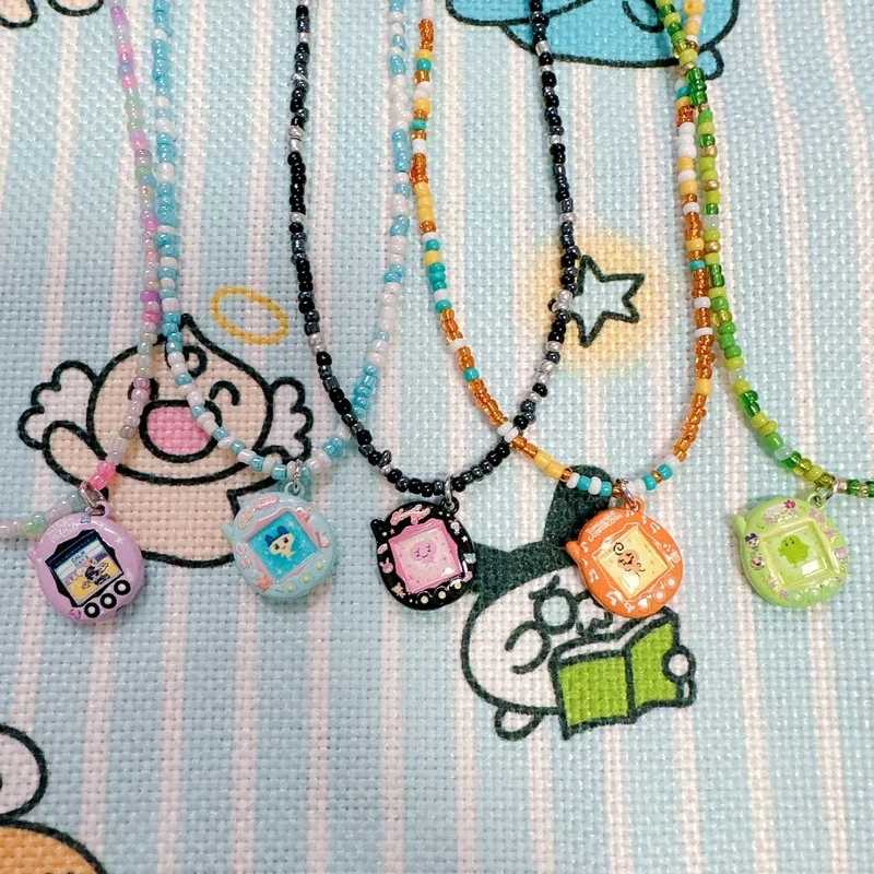 

Mini Tamagotchi Cute Alloy Pendant Keychain Phone Pendant Handmade Pendant Accessorie Fashion Decoration Gift Toy