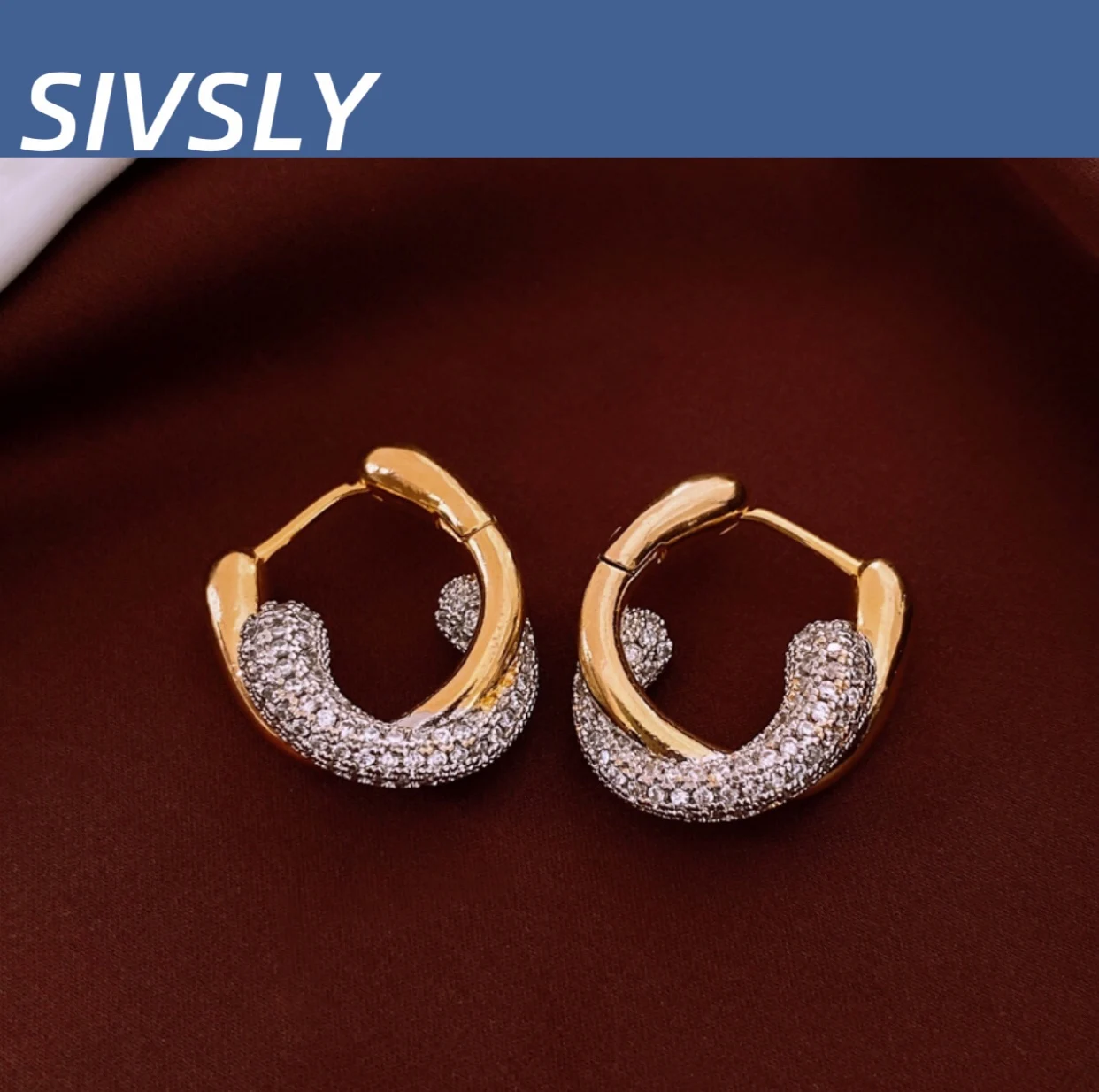 

Hot-selling European and American style zirconium high-end sense of individuality trendy and versatile earrings luxurious