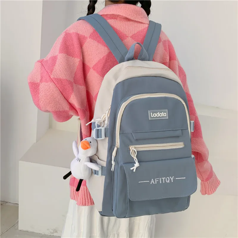 

TRAVEASY Korean Fashion Women Middle School Bags Nylon New Multiple Pockets Women Backpacks Large Capacity Panelled Laptop Bags