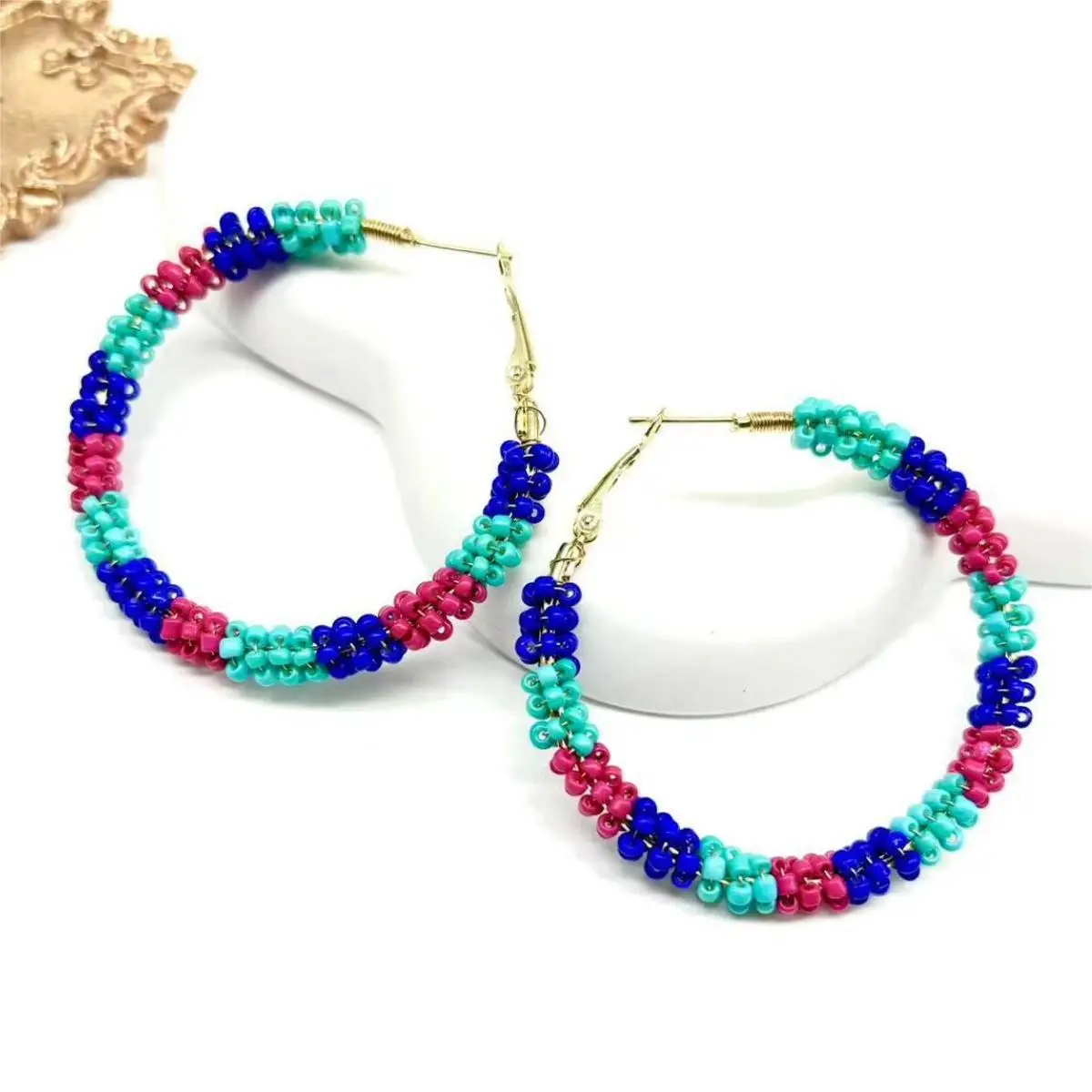 

Rice bead earrings Circle Entangle Color match Originality Hand knitting Bohemia Alloy Fashion Simple Beaded earrings