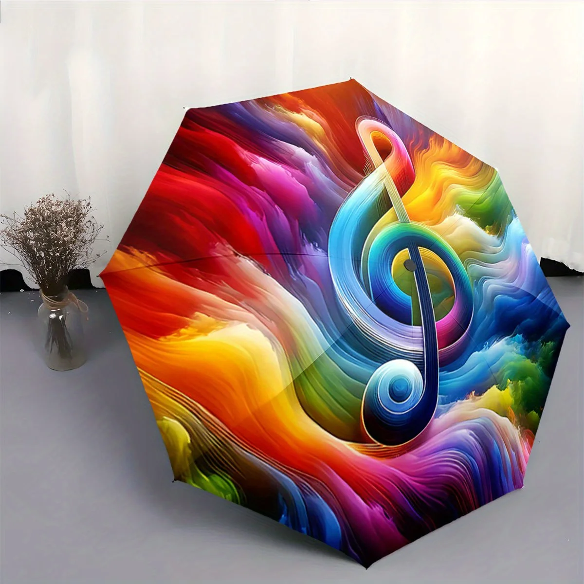 

Automatic Folding Umbrella A colorful treble clef on a swirling rainbow background. Portable collapsible design, casual outdoo