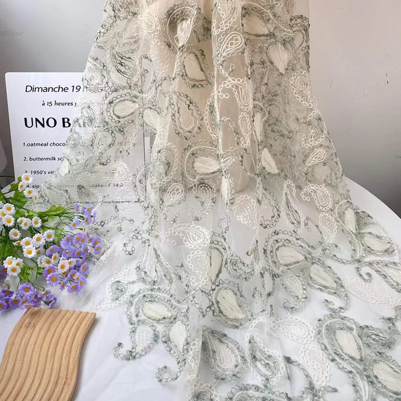 

Новый стиль, прозрачная кружевная ткань с цветком кешью, вышитая блестками, мягкая прозрачная ткань для свадебного платья, дизайнерский декор, швейная ткань