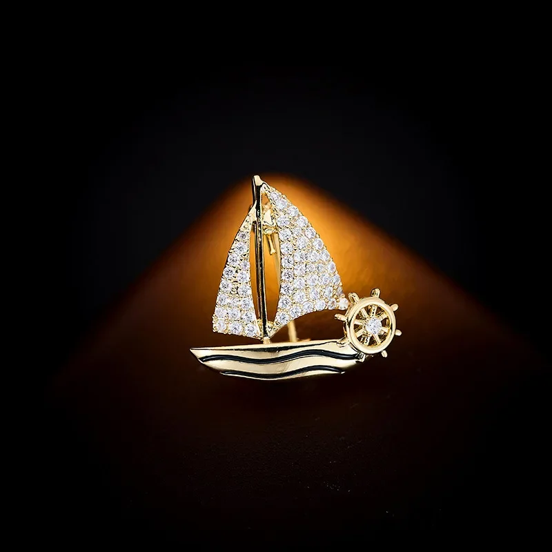 

The "Ride the Wind and Break the Waves" collar pin is a unisex exquisite sailboat brooch pin001