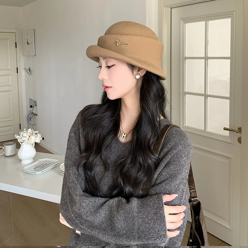A new style of women's fashionable and elegant woolen hat for outdoor warmth