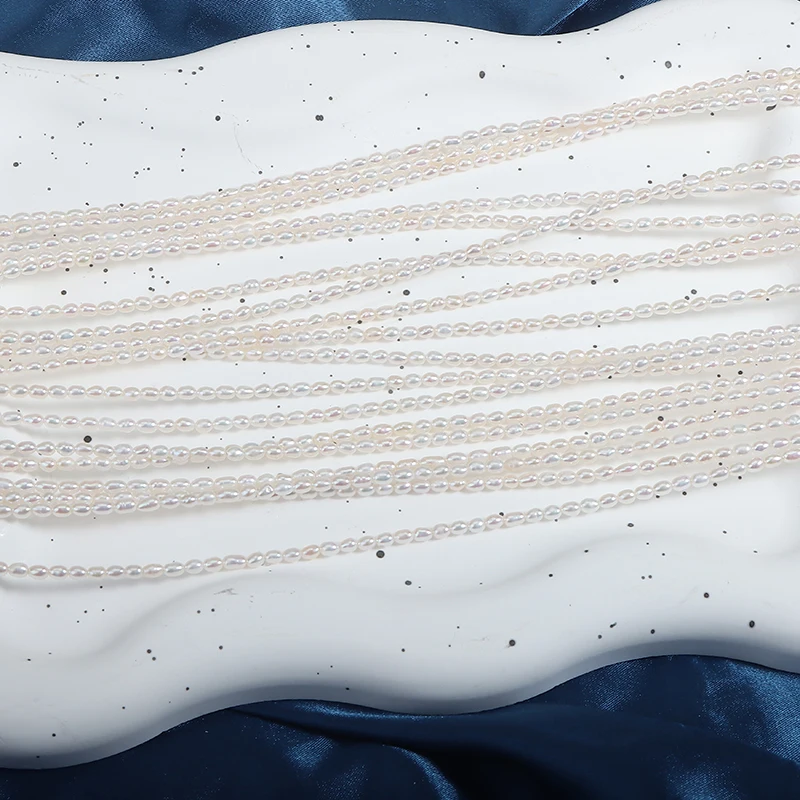 A Strand of 2.5-3mm mini Smooth Nucleus-Free Natural Freshwater Pearl Beads, Approximately 39cm in Length.