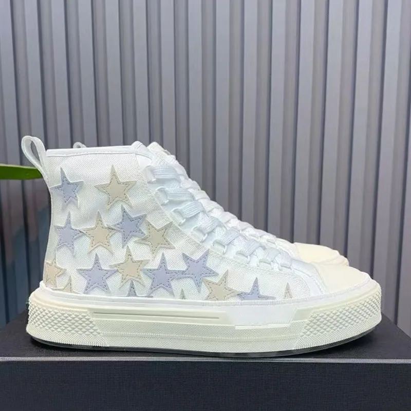 2025 primavera blanco de alta calidad de cuero genuino de los hombres versátil estilo coreano transpirable Mid-Top zapatillas de deporte Casual zapatos de moda