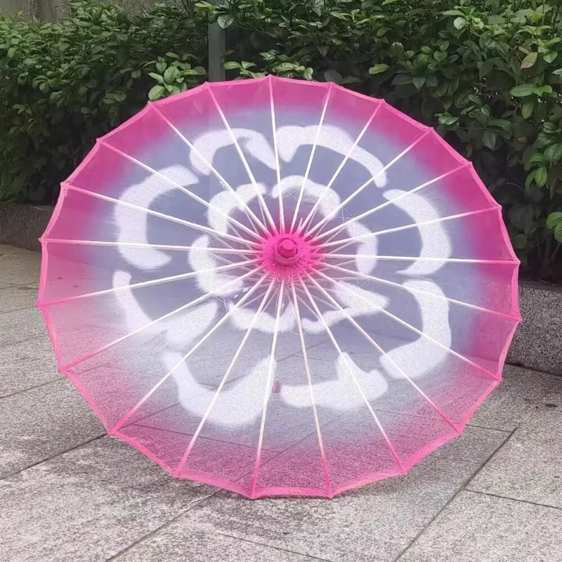 Dance umbrella jasmine blooms Dai Qingming rain on the rain stream spring travel picture dance evening same umbrella