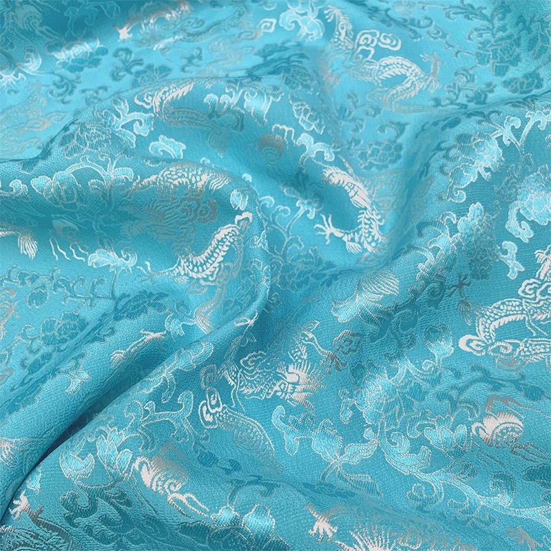 

1 meter 100% Mulberry Silk 19 momme Heavy Totem Dragon Jacquard Silk Fabric Light Blue Color 114cm 45" wide by the yard JX207