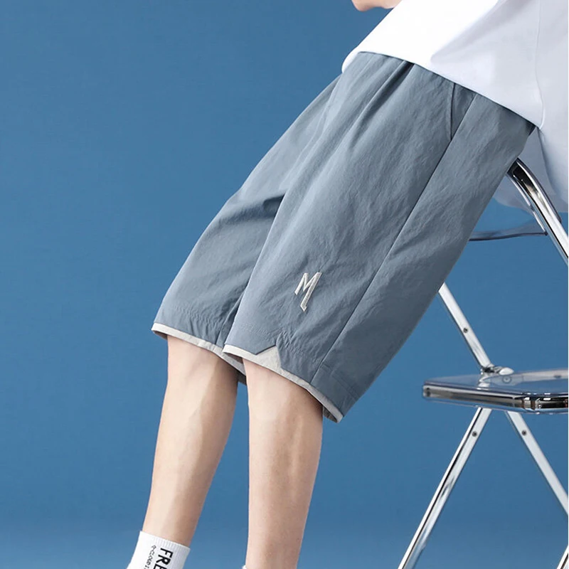 Pantalones deportivos holgados para correr para hombre, pantalón informal, fino, de seda helada, para verano, para estudiantes, pierna recta de cintura media alta de cinco puntos