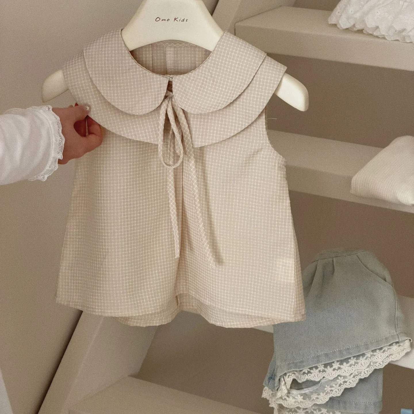 camiseta-infantil-coreana-da-moda-para-meninas-novo-item-de-verao-2026-blusa-solta-casual-sem-mangas-estilo-boneca