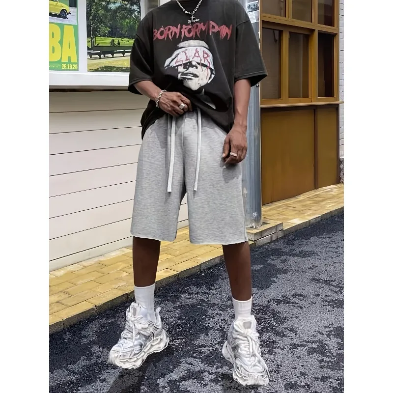 شورت كاجوال صيفي رمادي فاتح للرجال بحزام مطاطي مع نسخة فضفاضة قابلة للتنفس مناسبة لسراويل رياضية #1