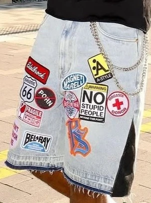 Pantalones cortos de mezclilla de calle Retro americanos Y2K para hombres y mujeres, pantalones cortos sueltos con costuras, moda Hip Hop, ropa informal holgada