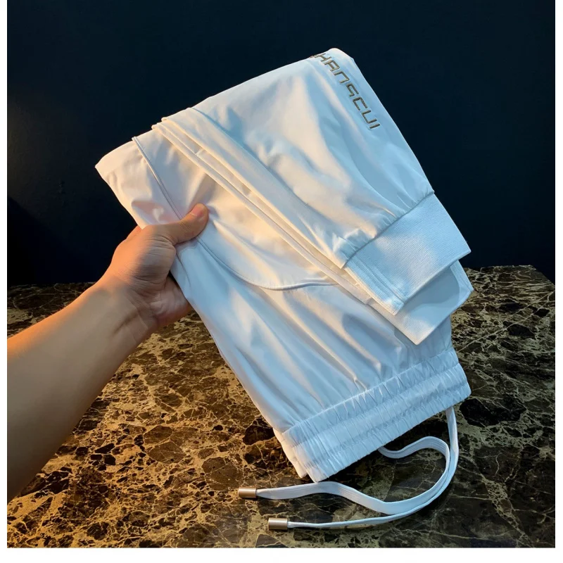 

Summer thin ice silk casual pants for men, 2025 new fashionable breathable drawstring leg tied sports pants