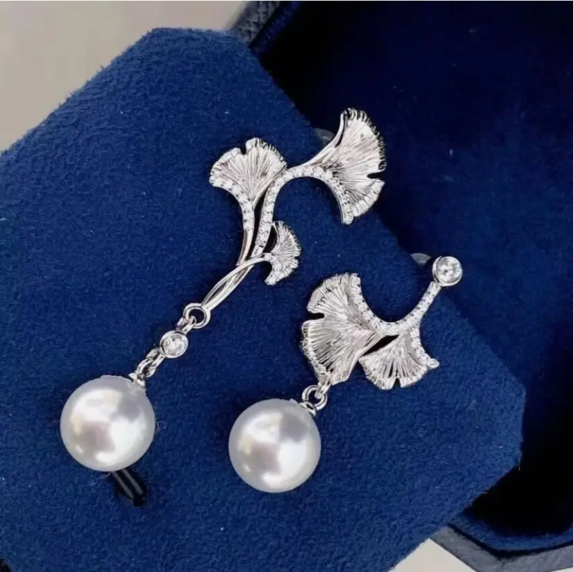 

Великолепные круглые висячие серьги с белым жемчугом Южного моря 10-11 мм, 925-х годов